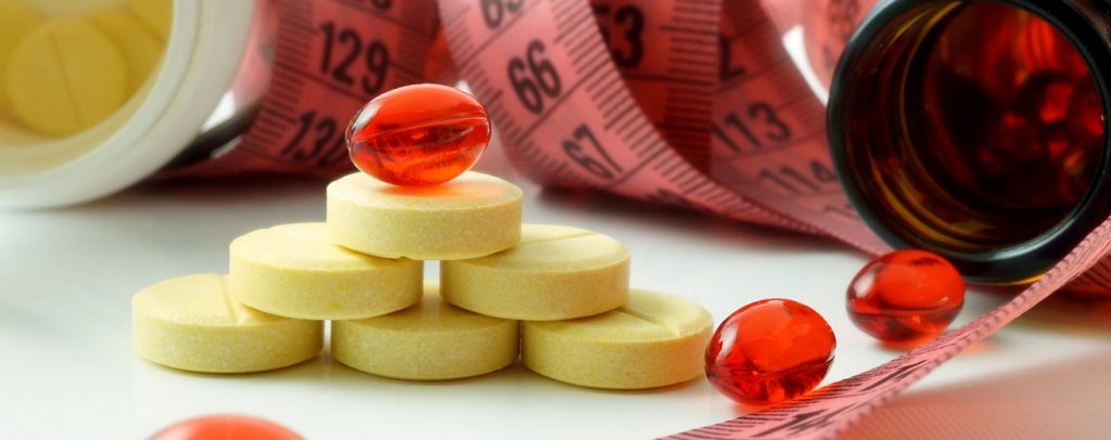 Meetlint en capsules en pillen op tafel